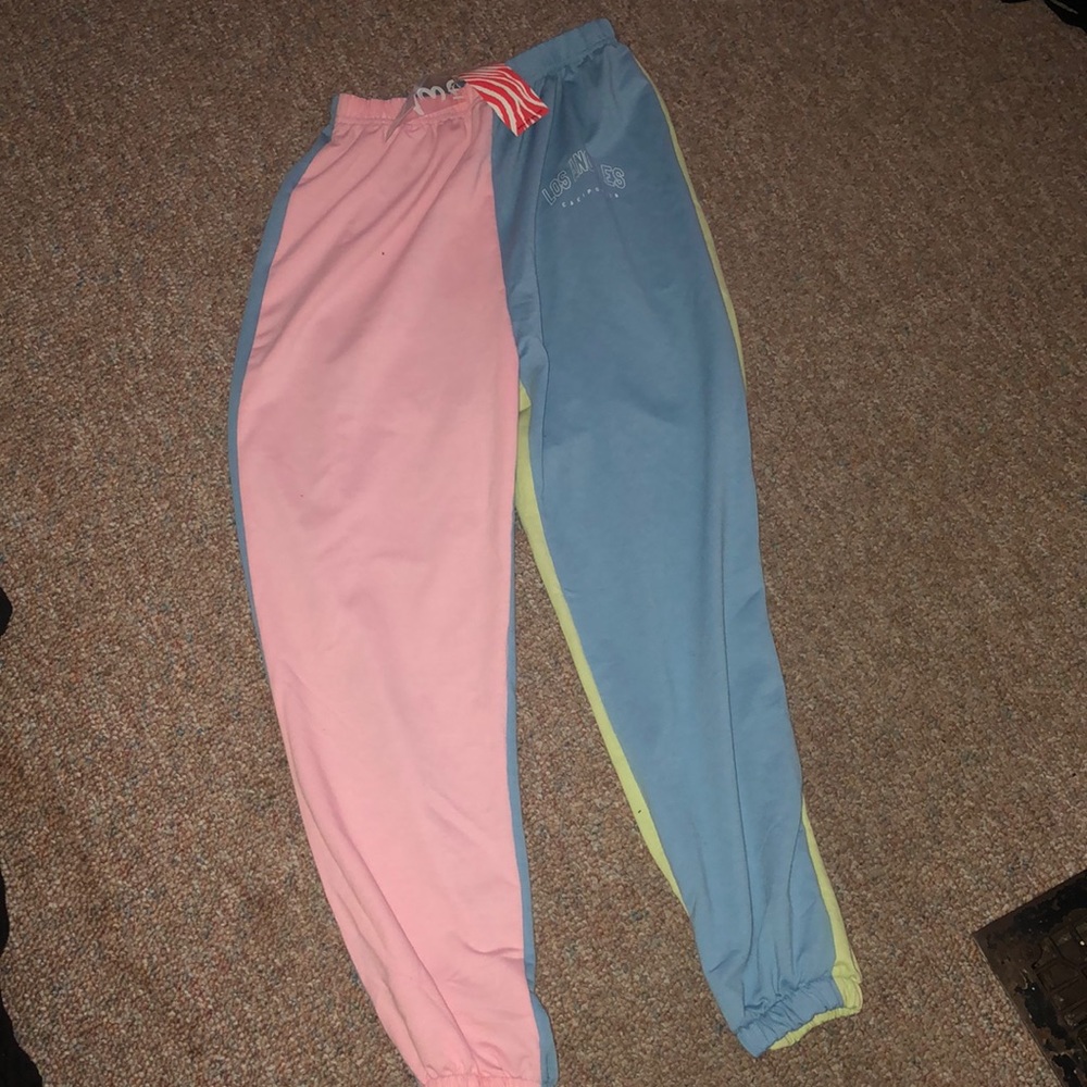 Romwe size Extra small  joggers with tags . Multicolored joggers.